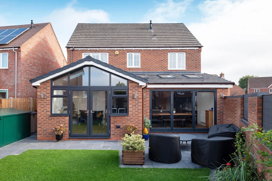 Rear double storey extension in Essex built by Timber Construction, adding extra living space and modern finishes.