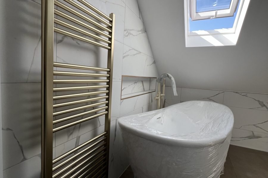 Loft conversion specialists UK transforming a residential loft into a modern living space by Timber Construction Essex LTD